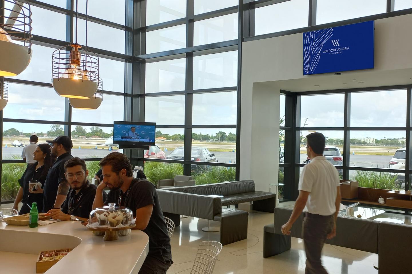 Waldorf Astoria Hilton campaign on a private airport screen